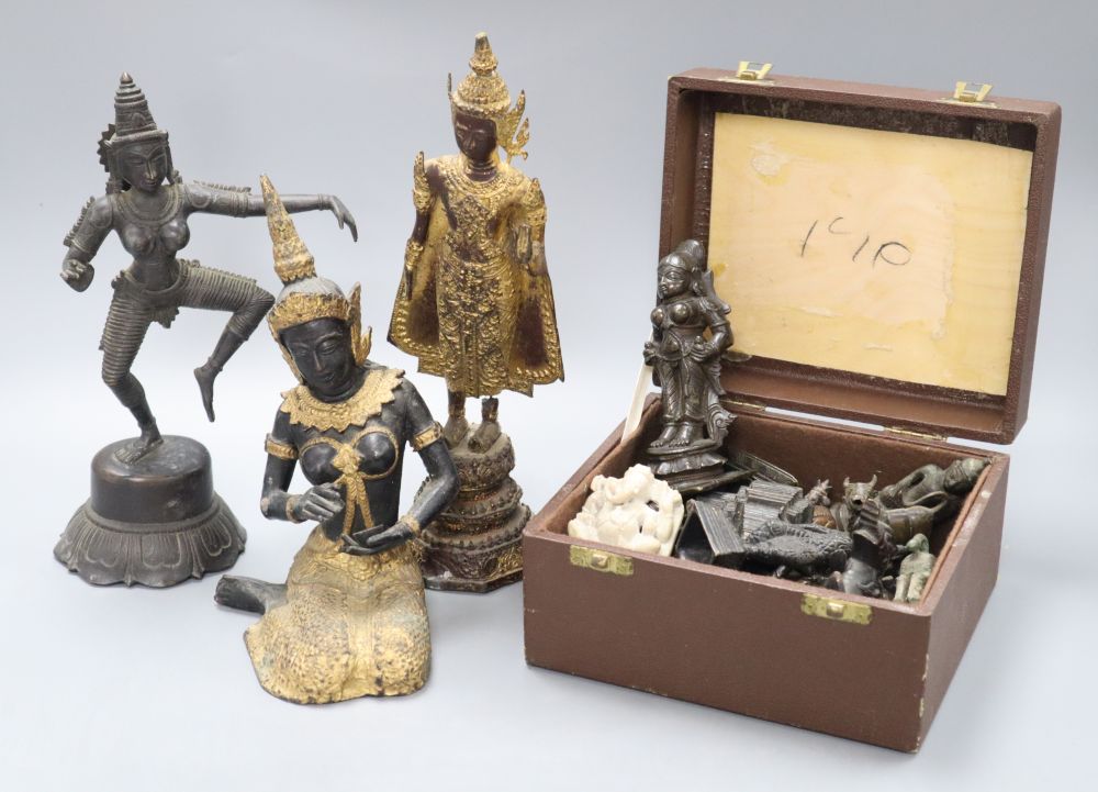 A group of 19th century and later Indian and Thai bronze and metal figures, tallest 28cm